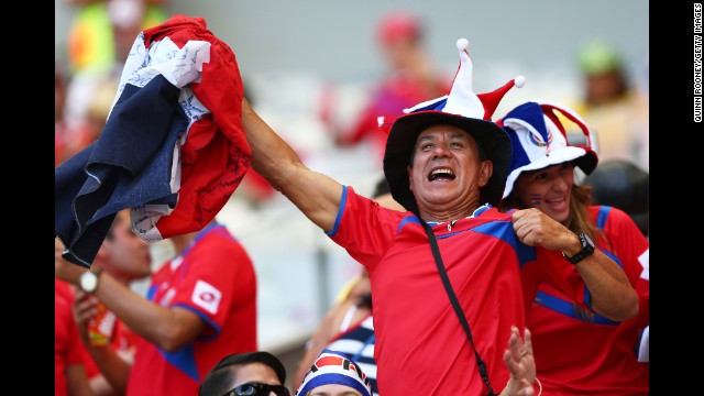 A Costa Rica fan enjoys the atmosphere prior to the match against England. 