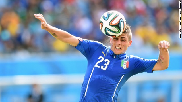 Midfielder Marco Verratti of Italy heads the ball. 