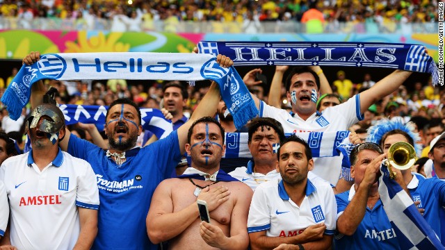 Greece fans cheer during the game against the Ivory Coast.