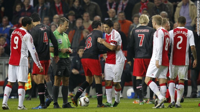 During his time in the Netherlands with Ajax in 2011, Suarez was banned for seven games after leaving a scar on the collarbone of Amsterdam player Otman Bakkal.