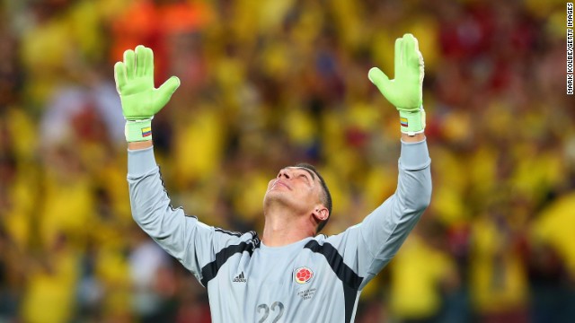Goalkeeper Faryd Mondragon of Colombia acknowledges fans after his team defeated Japan 4-1 during a match in Cuiaba, Brazil.