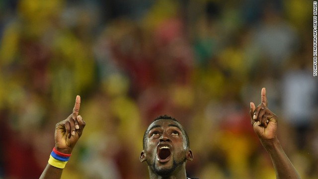 Colombia's Jackson Martinez celebrates after scoring his second goal against Japan.