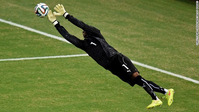 Ivory Coast's goalkeeper Boubacar Barry makes a save against Greece.