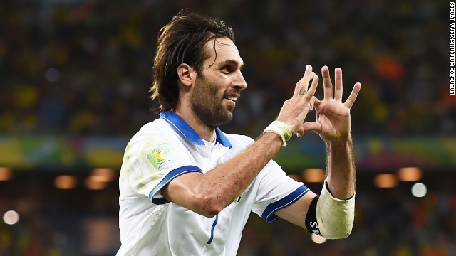 Giorgos Samaras of Greece celebrates scoring his team's second goal on a penalty kick against the Ivory Coast on Tuesday, June 24, in Fortaleza, Brazil. Greece won 2-1.
