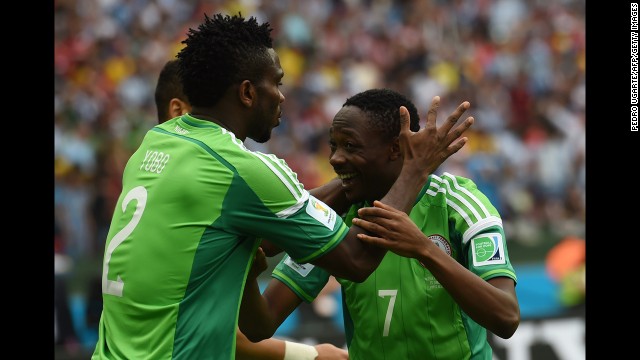 Musa, right, celebrates his goal with Nigeria defender Joseph Yobo during a match against Argentina.