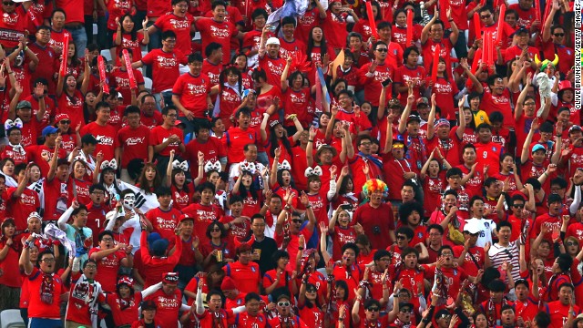 South Korea fans cheer.