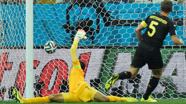 Belgium defender Jan Vertonghen, right, scores