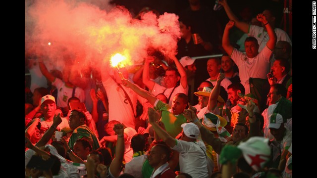 Algeria fans celebrate their team's first goal.