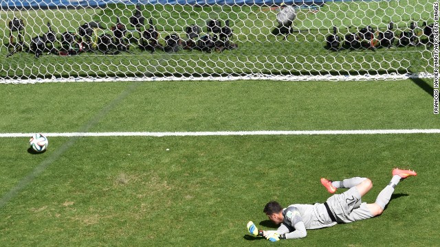 Brazil's goalkeeper, Julio Cesar, concedes a goal to Alexis Sanchez during a World Cup game against Chile in Belo Horizonte, Brazil, on June 28. The first game of the elimination round ended with a score of 1-1. Brazil advanced to the quarterfinals by winning a penalty kick shootout.