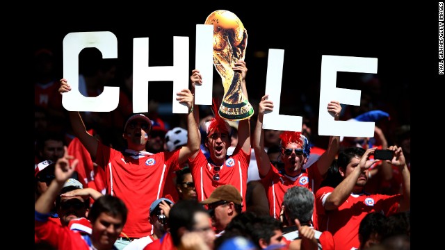 Chile supporters cheer together at Mineirao Stadium in Belo Horizonte, Brazil.
