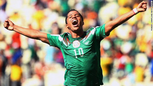 Giovani dos Santos of Mexico celebrates scoring his team's goal against the Netherlands.