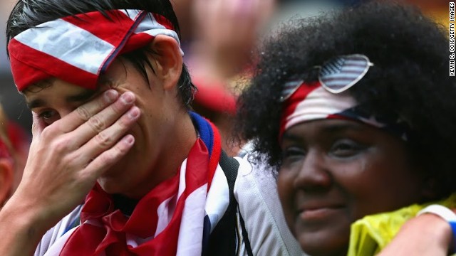 A fan sheds tears of joy after the U.S. reached the knockout stages of the World Cup.