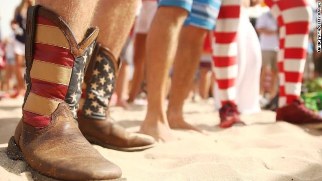 This U.S. fan shows his pride in the achievements of his team by wandering around the beaches of Brazil in stars and stripes-themed cowboy boots.