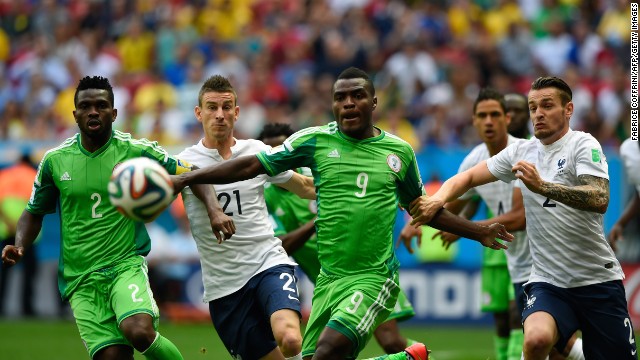 Yobo, left, and Nigerian forward Emmanuel Emenike, third left, chase after the ball near French defenders Koscielny, second left, and Mathieu Debuchy, far right.