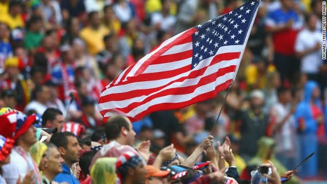 The American flag flies proudly at the Arena Pernambuco in Recife during the USA's 1-0 defeat by Germany. 