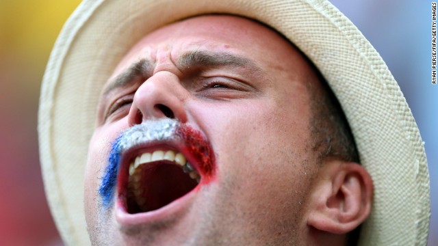 A France fan cheers before the game. See the best World Cup photos from June 29