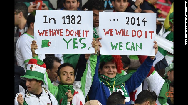 Algeria fans cheer during the match.