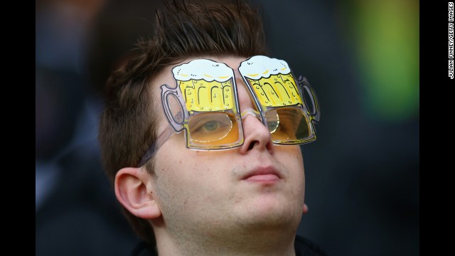 A fan looks on prior to the match between Germany and Algeria.