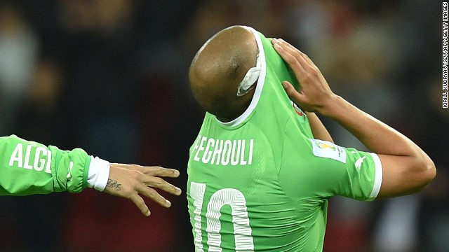 Algeria's Sofiane Feghouli reacts after losing against Germany.