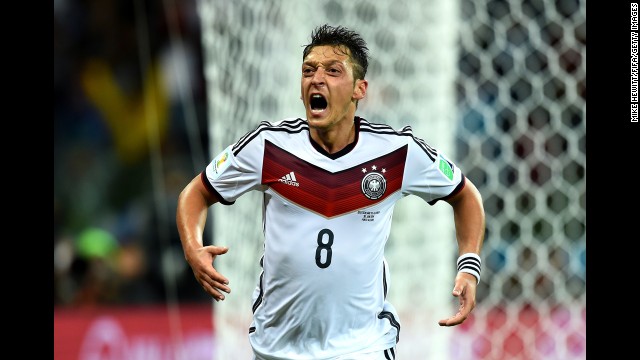 Mesut Oezil of Germany celebrates scoring his team's second goal.