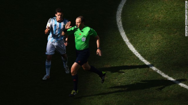 Fernando Gago of Argentina appeals to referee Jonas Eriksson.