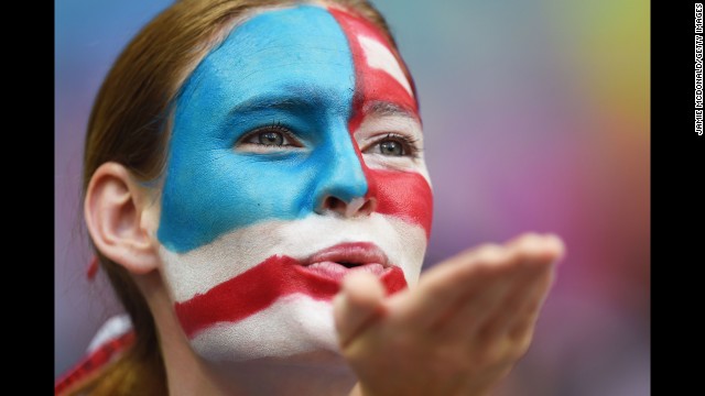 A U.S. fan blows a kiss.