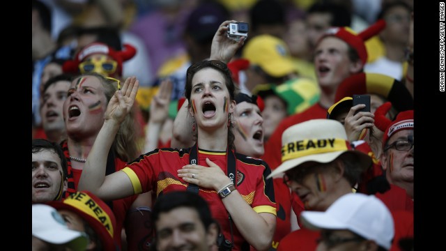 Belgium supporters cheer for their team.