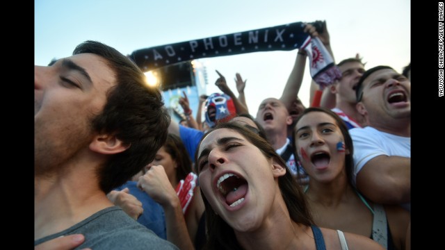 U.S. fans react as they gather to watch the match at Copacabana beach in Rio de Janeiro.