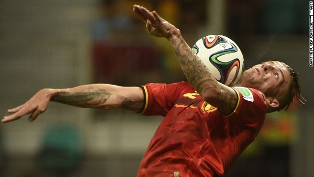 Belgium defender Toby Alderweireld controls the ball on his chest.