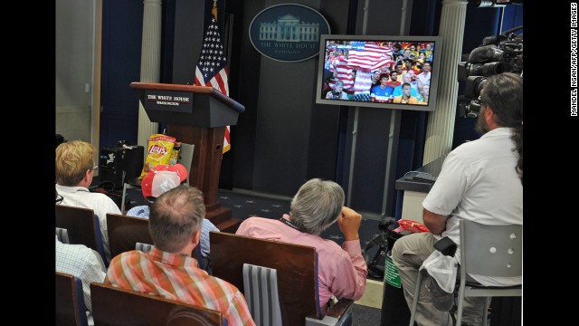 Members of the White House press corps watch the match in Washington.