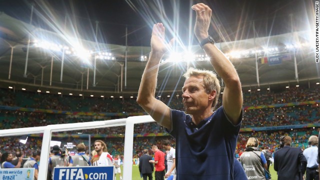 United States head coach Jurgen Klinsmann applauds the fans after losing to Belgium in a World Cup round-of-16 match Tuesday, July 1, in Salvador, Brazil. Belgium won 2-1 in extra time to advance to the quarterfinals of the soccer tournament. The United States is out of the competition.