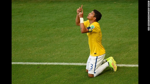 Thiago Silva celebrates after scoring a goal early in the match to give Brazil a 1-0 lead.