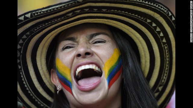 A Colombia supporter cheers prior to the game. 