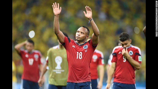 Colombia defender Juan Camilo Zuniga waves after the game.