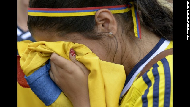A Colombia fan cries in Medellin, Colombia, after the team lost to Brazil.