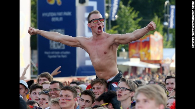 Fans of Germany celebrate at the Brandenburg Gate in Berlin while watching the quarterfinal victory over France on July 4. 