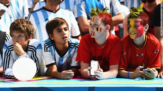 Young fans of both Argentina and Belgium cheer prior to the match.