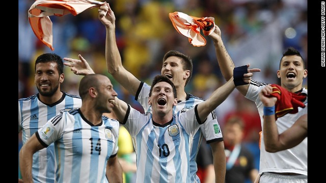 Argentina forward and captain Lionel Messi, center, celebrates with teammates after winning their quarterfinal match against Belgium on July 5. 