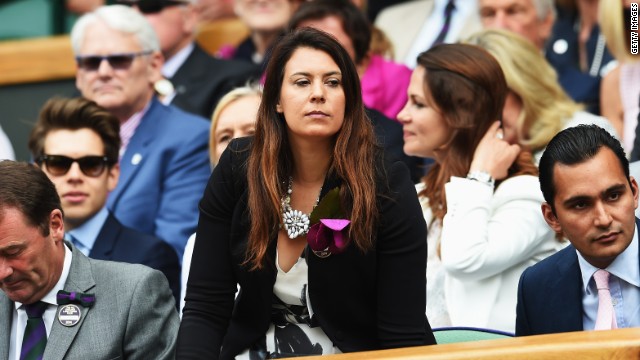 Nearby, reigning champion (although not for long) Marion Bartoli casts her eyes across proceedings.