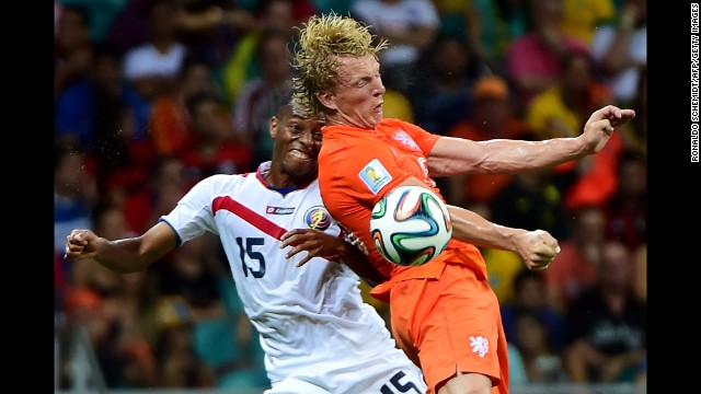 Costa Rica defender Junior Diaz, left, and Netherlands forward Jeremain Lens vie for the ball. 