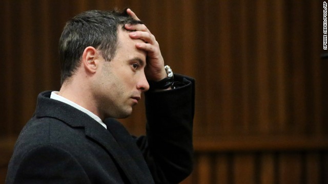 Oscar Pistorius sits in court in Pretoria, South Africa, on Tuesday, July 8. Pistorius, the first double amputee runner to compete in the Olympics, is accused of intentionally killing his girlfriend, Reeva Steenkamp, in February 2013. Pistorius has pleaded not guilty to murder and three weapons charges.