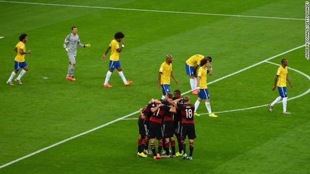German players celebrate their fifth goal.