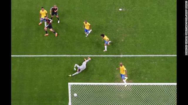 Germany's Miroslav Klose, second from left, scores his team's second goal. The goal also made Klose the all-time leading scorer in World Cup history.