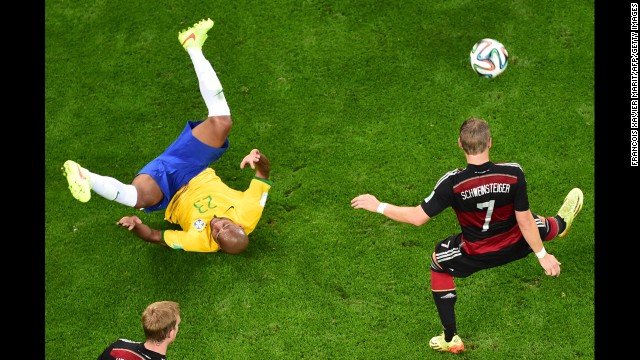 German midfielder Bastian Schweinsteiger controls the ball. 