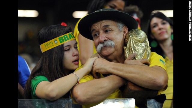 A Brazil fan cries after the match in Belo Horizonte.