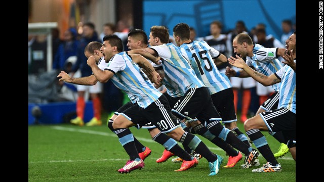 Argentina players run to celebrate their victory after a penalty shoot-out following extra time during their World Cup semifinal match against the Netherlands on Wednesday, July 9, in Sao Paulo, Brazil. Argentina defeated the Netherlands 4-2 on penalties and will go on to face Germany in the final. 