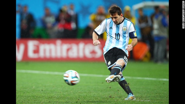 Argentina captain Lionel Messi shoots and scores a goal in a penalty shootout.