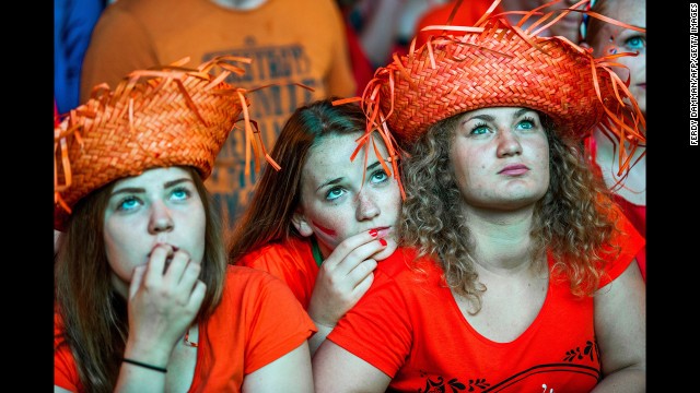 The market square in Groningen, Netherlands, is filled with supporters of the Dutch national football team. Despite the rain, 4,500 people gathered to watch the World Cup semifinal match between the Netherlands and Argentina.