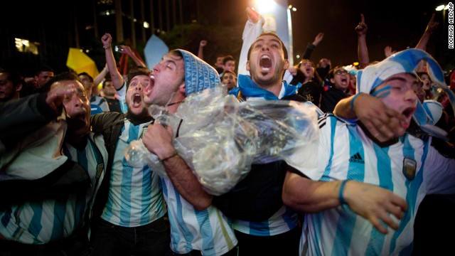 Fans of Argentina celebrate after their team defeated the Netherlands in Sao Paulo, Brazil.