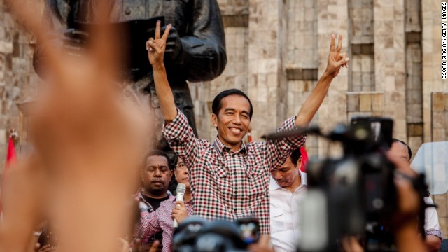 Indonesian presidential candidate Joko Widodo greets his supporters as he declares victory in the election. But official election results are expected July 22. 